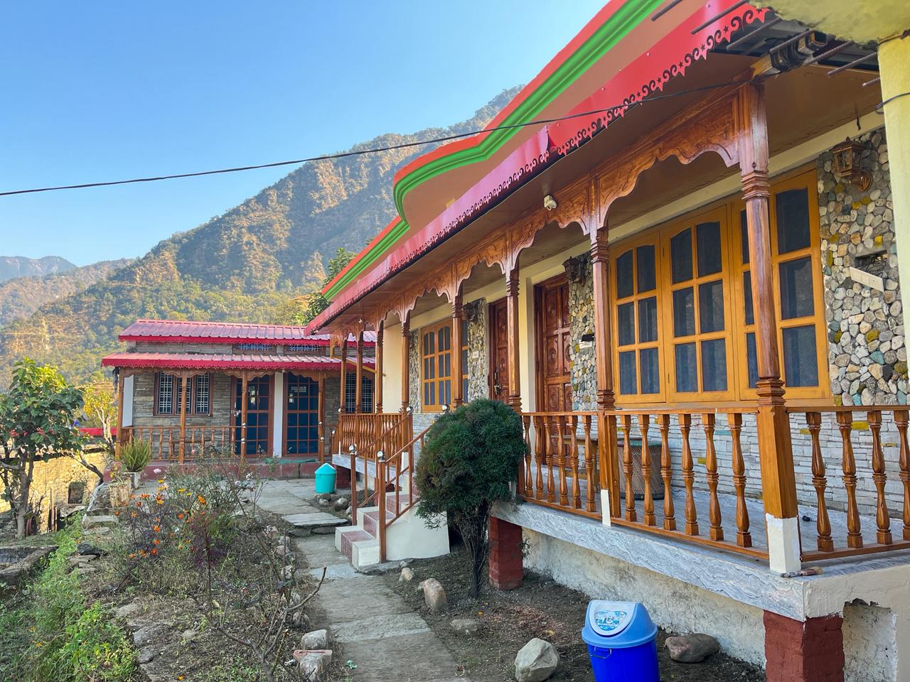 Scenic mountain cottage with wooden accents.